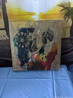 Front view of abstract painting showing colors, clock face and overall condition