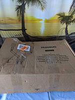 Closed original HUANUO box showing product label