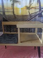 Full view of telephone bench showing seat, side table, shelf, legs and backdrop