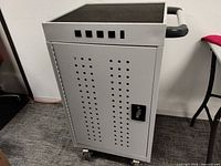 Front view of gray/silver charging cart on caster wheels