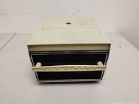 Front view of RCA Victor cartridge tape player/recorder showing logo and handle
