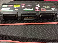 Black Easton hard case exterior with stickers