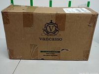 Front of Vancasso shipping box showing logo
