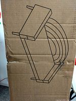 Cardboard box graphic depicting assembled bench frame