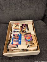 Full card storage box filled with loose basketball cards