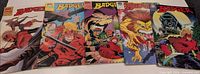 Group shot of five Badger comics laid side by side