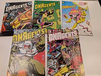 Group shot of all five DNAgents comic books