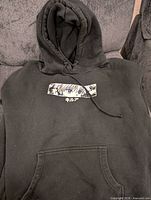 Front view showing Killua graphic, hood, kangaroo pocket