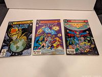 Front covers of all three Invasion! comics