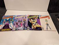 Front covers of all four Legionnaires #3 comic books laid side by side
