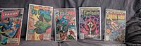 Group shot of all five bagged Bronze Age comics