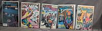 Group shot of all five bagged comic books side by side
