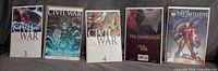 Five bagged and boarded Civil War related single issues lined up