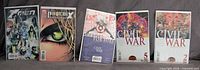 Group shot of all five bagged comic issues