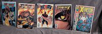 Five Marvel comic issues side-by-side: four Phoenix Endsong, one X-Factor
