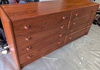 Full view of dresser front showing eight drawers and pulls