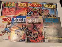 All eight Scout: War Shaman comic issues laid out