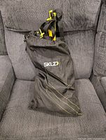 SKLZ branded black drawstring bag holding set