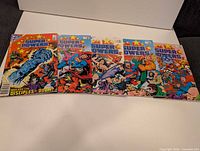 All five Super Powers comic books laid out side by side