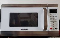 Front view showing Cuisinart branding, door, control panel
