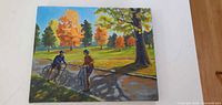 Front view of entire painting showing cyclists and autumn scene