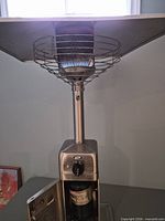 Full view of stainless steel tabletop patio heater