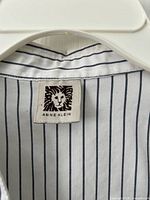 Anne Klein label on striped fabric