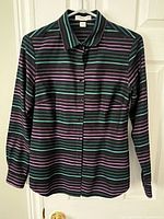 Full view of blouse hanging, showing overall style and stripe pattern