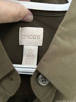 Brand and size tag reading "Chico's 0"