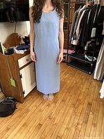 Front view of pale blue handmade sleeveless slip dress worn by model