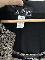 Brand tag showing Alex Evenings and size S inside garment