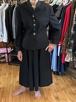 Full view of jacket and skirt on model