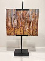 Front view on stand showing full artwork