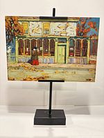 Front view of lithograph panel on stand
