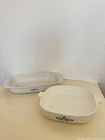 Overview of both Corning Ware casseroles showing shapes and blue cornflower pattern