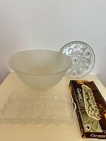 All four glass items together: frosted punch bowl, round platter, rectangular Carmen tray in box, Christmas dish