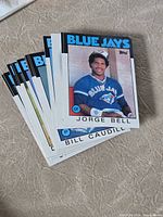 Front view showing stack of Blue Jays cards, top card Jorge Bell