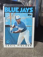 Front of 1986 Topps Cecil Fielder rookie card in sleeve