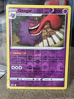 Front of Gengar reverse holo card in protective sleeve