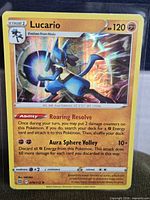 Front of Lucario Brilliant Stars holo card in sleeve