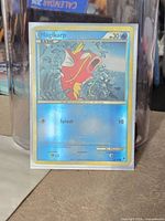 Front of Magikarp reverse holo card in sleeve