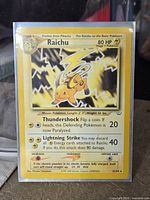 Raichu card in protective sleeve front view