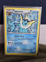 Front view of Vaporeon BW89 Cosmos Holo card