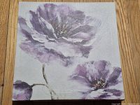 Front view of square canvas showing purple floral artwork