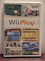 Front of Wii Play case showing artwork and title
