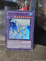 Front of Elemental HERO Absolute Zero card standing upright showing holographic art, limited edition stamp, stats and text.