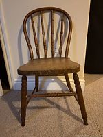 full view of one Windsor spindle-back chair