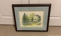 Framed artwork front view showing full composition and frame