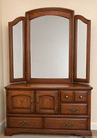Full view of oak dresser with tri-fold mirror attached