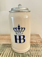 Front view showing HB crown logo on stoneware body